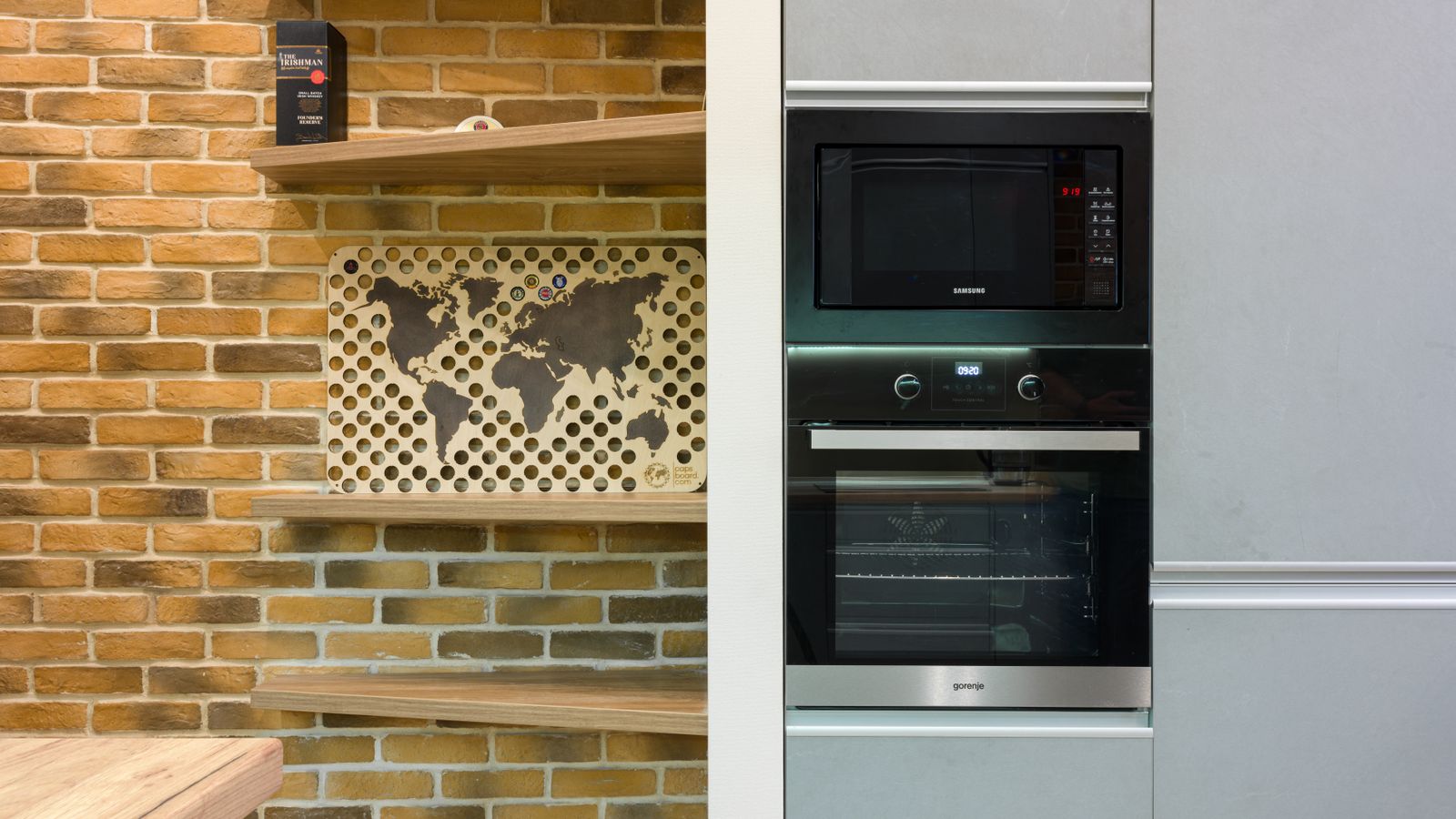 Built-in wall oven installed in white kitchen cabinetry