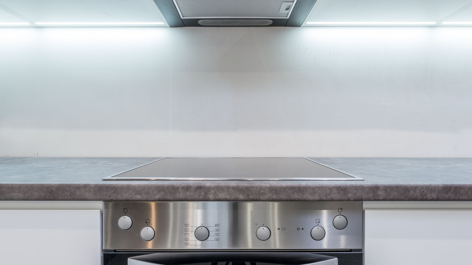 Kitchen layout showing wall oven positioned near cooktop and counter workspace