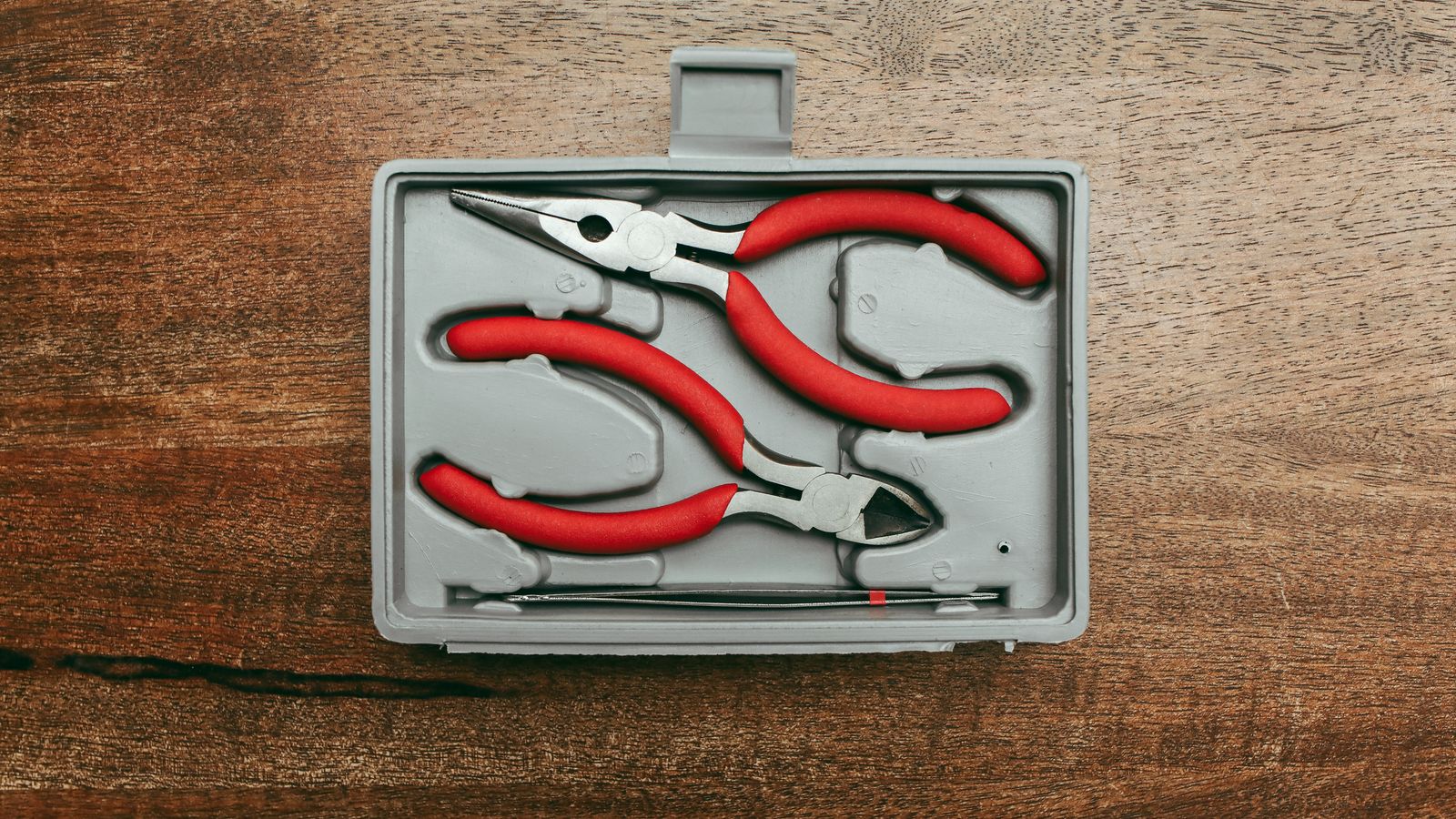 Wall anchors and safety hardware for securing tall furniture pieces
