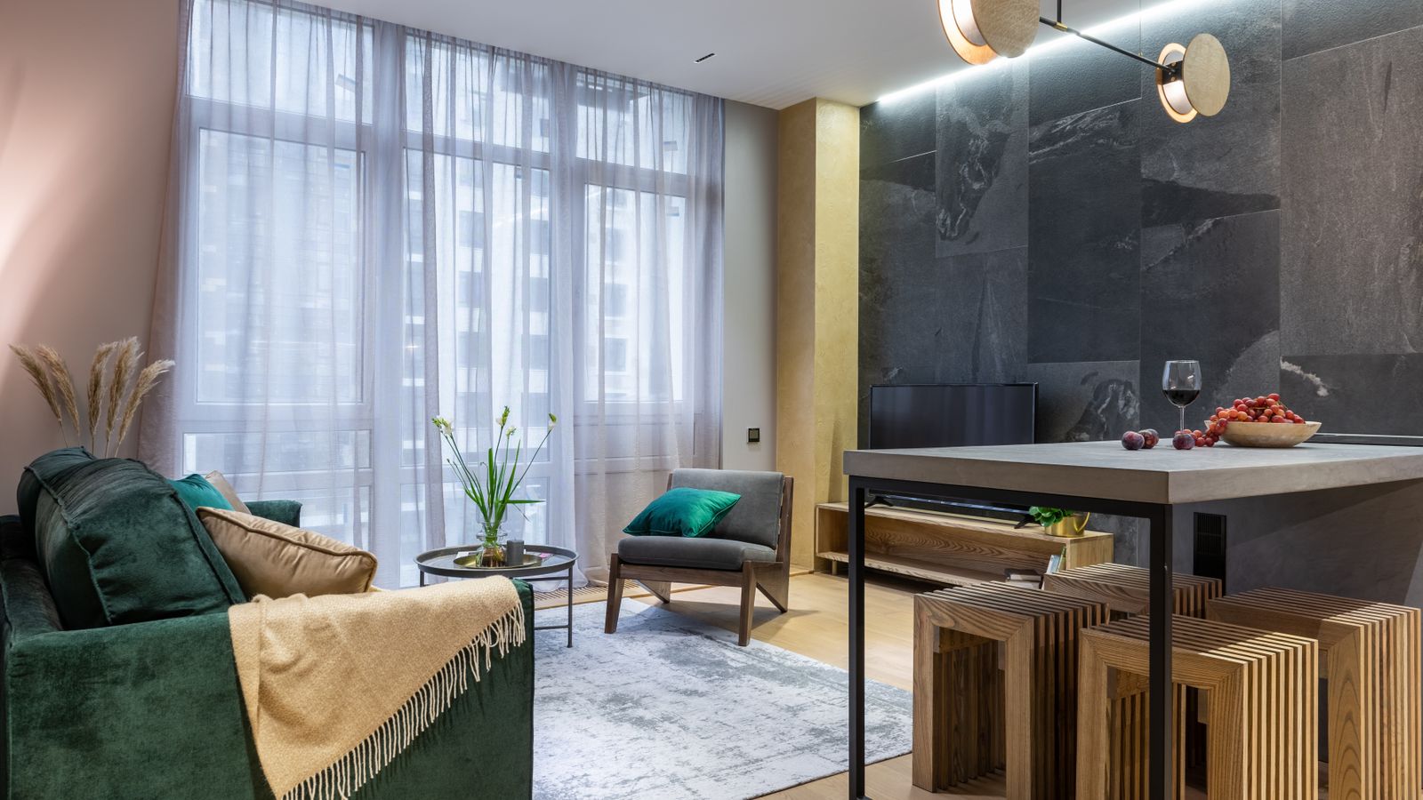 Cozy furnished living room with layered textiles and warm lighting
