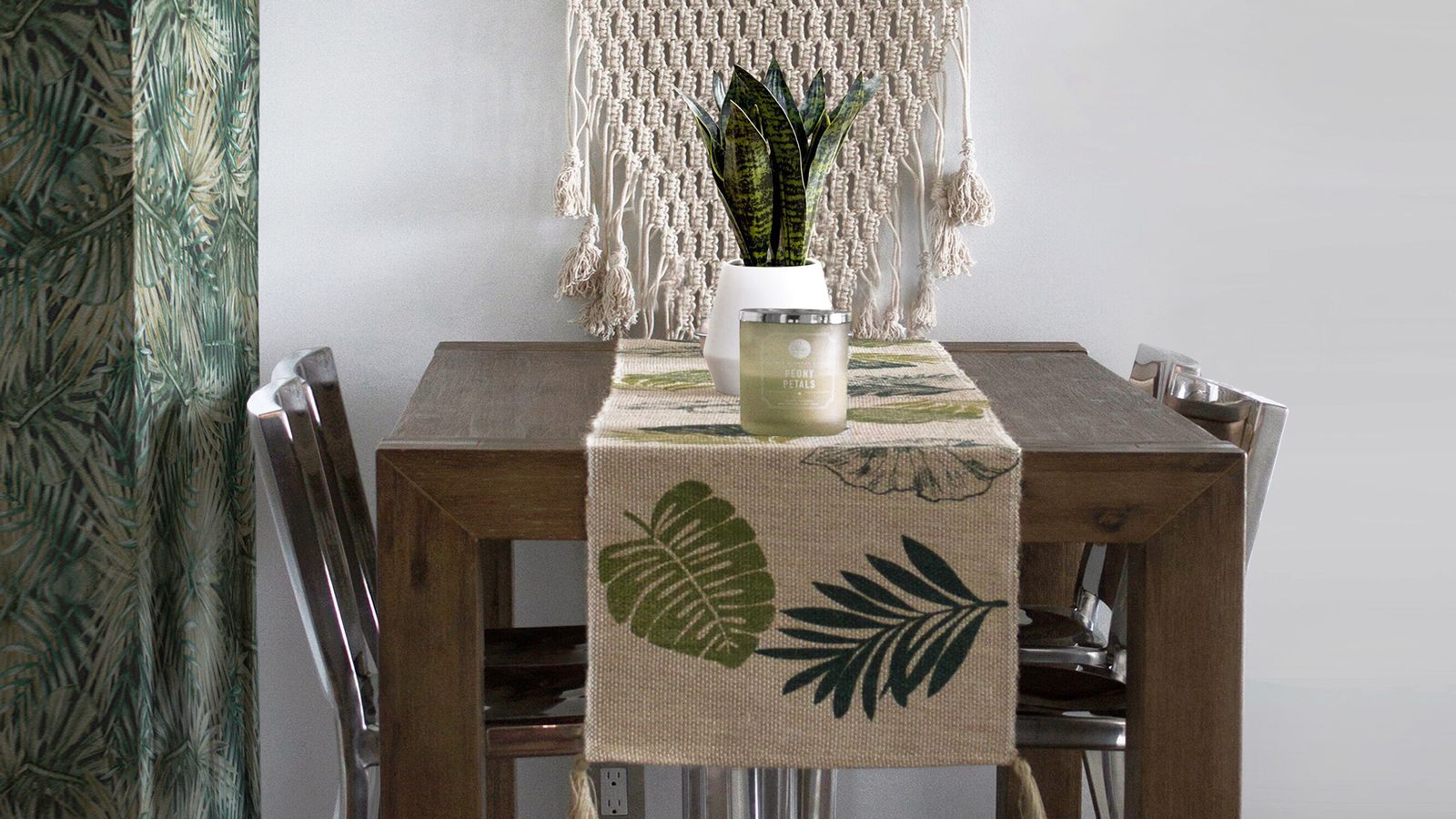 Roll of decorative wallpaper samples arranged for a dining room accent wall