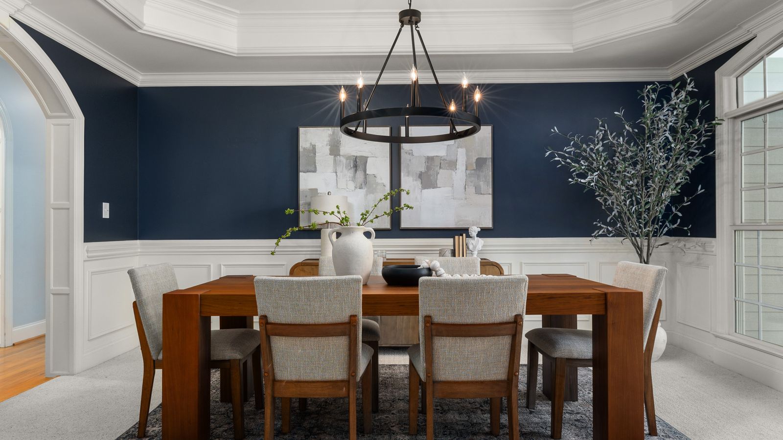Peel and stick tile flooring installed in a dining area with contemporary decor