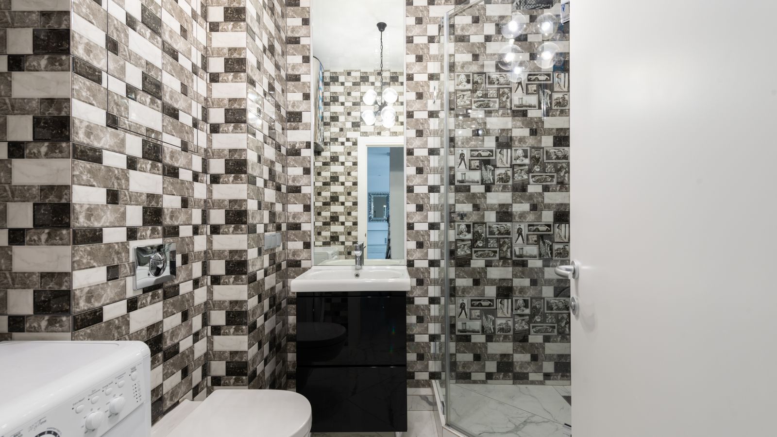 Bathroom sink counter with a soap dispenser and everyday toiletries