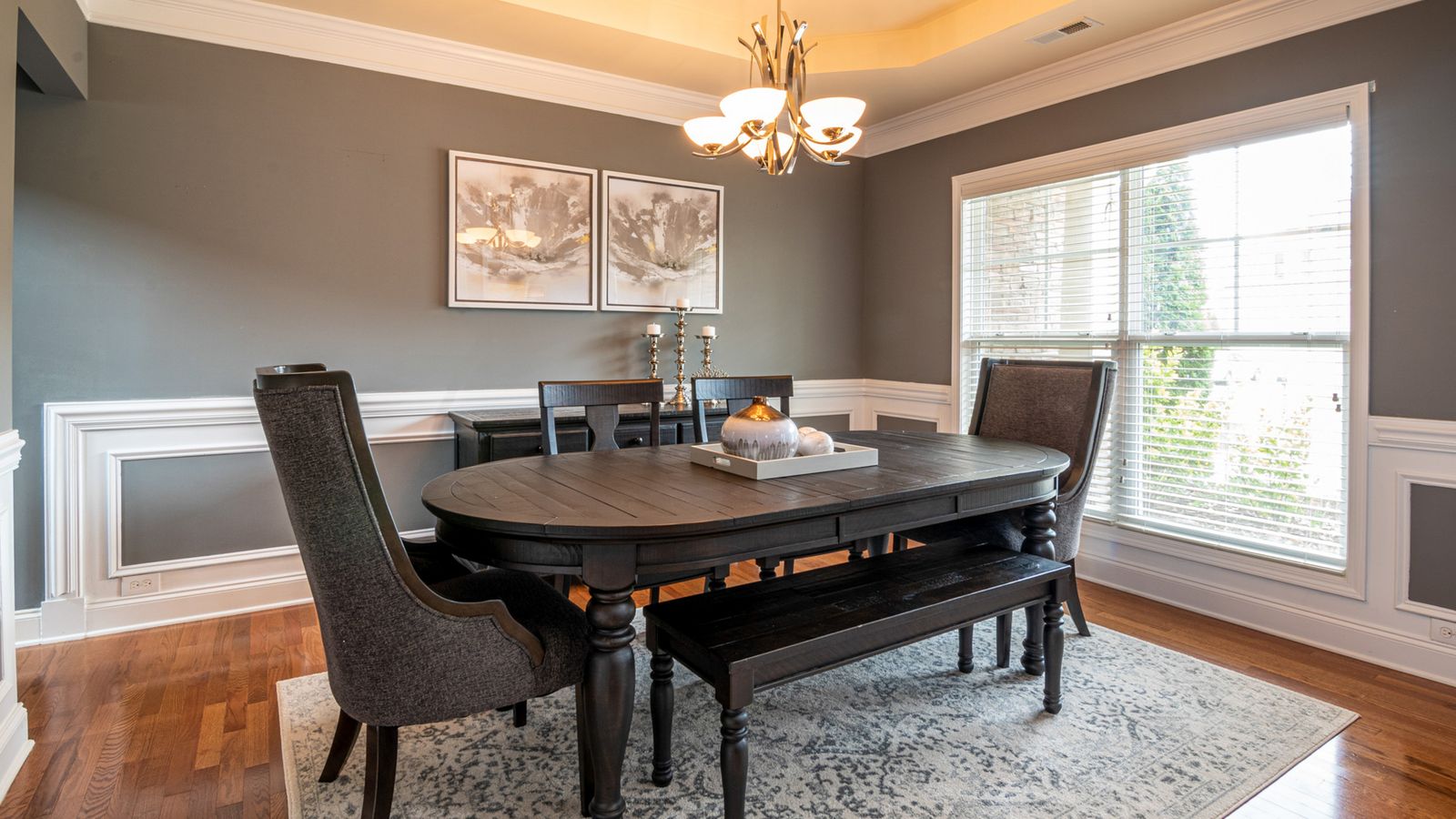 Close-up of textured wood slat wall panel installation in a dining room