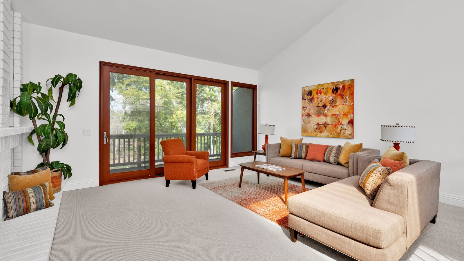 Living room with chaise lounge positioned near a window for a relaxed seating nook