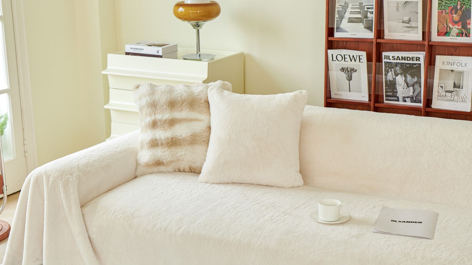 Living room sofa styled with a well-fitted slipcover and cushions