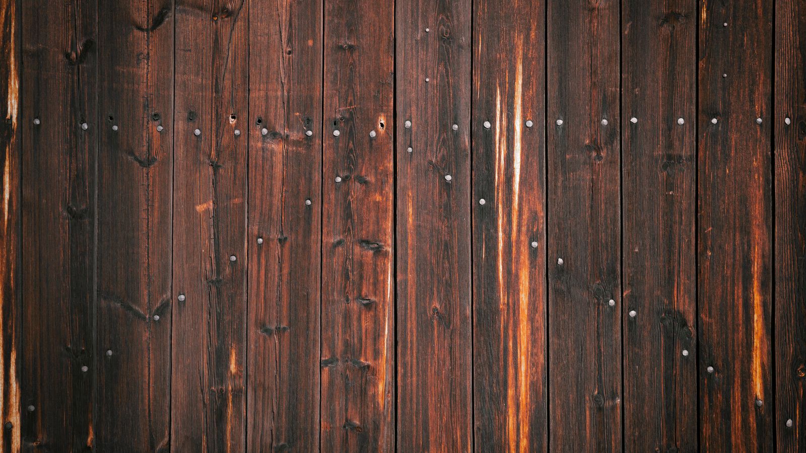 Restored wooden furniture surface after a successful scratch repair with matching finish