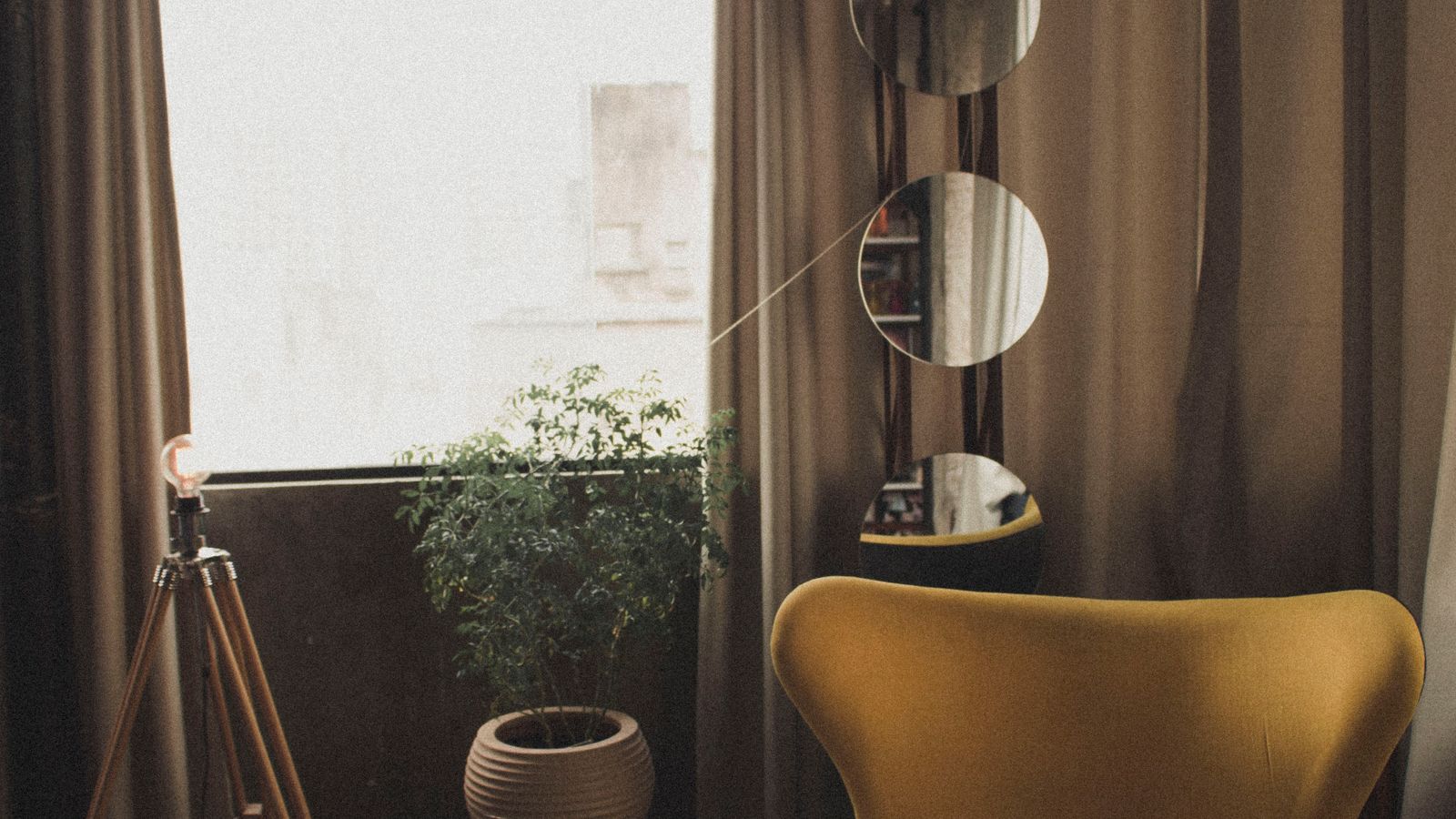 Cozy chaise lounge positioned near a window as a relaxed reading corner